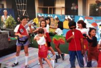 dated 1995 shows students performing a play outside
