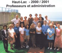 a staff group photo on the roof of the old primary school dated 2000/2001